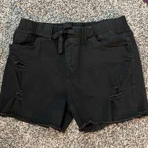 Large black distressed shorts